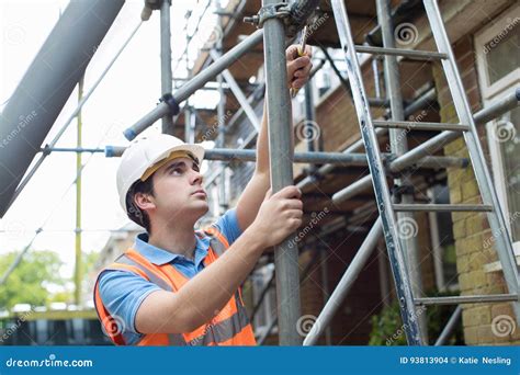 Putting up a construction .